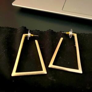 Kendra Scott hoop earrings.